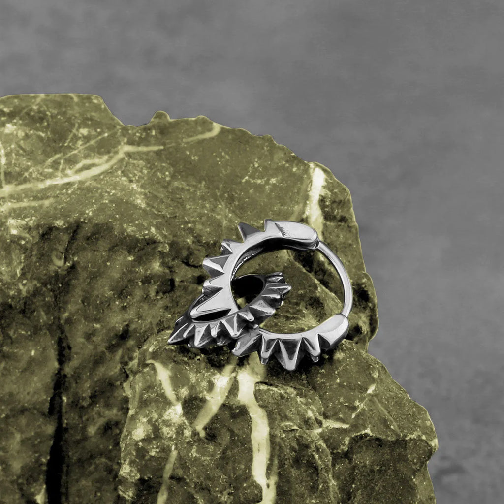 Pair of simple stainless steel round ring earrings with a polished finish and steel colour.