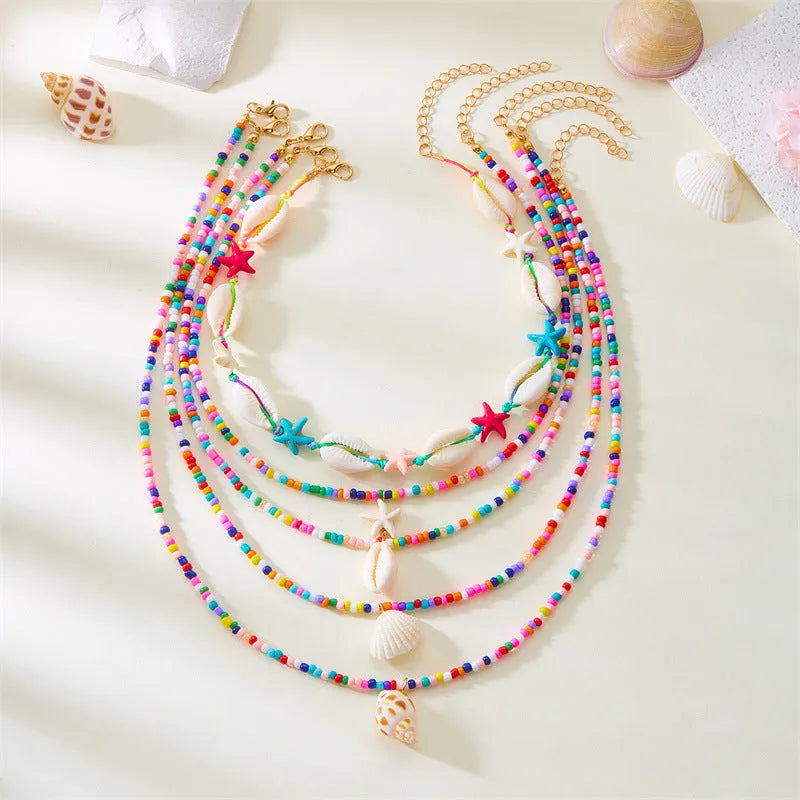 Multi-layer women's necklace set with starfish, shell and conch beads on adjustable 21-50cm perimeter