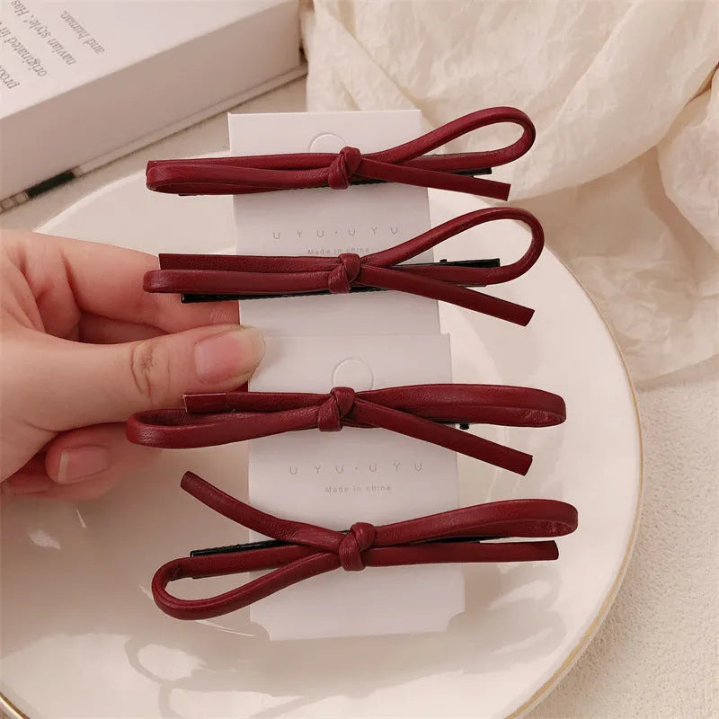 Wine red leather bow barrettes hair clips handcrafted construction