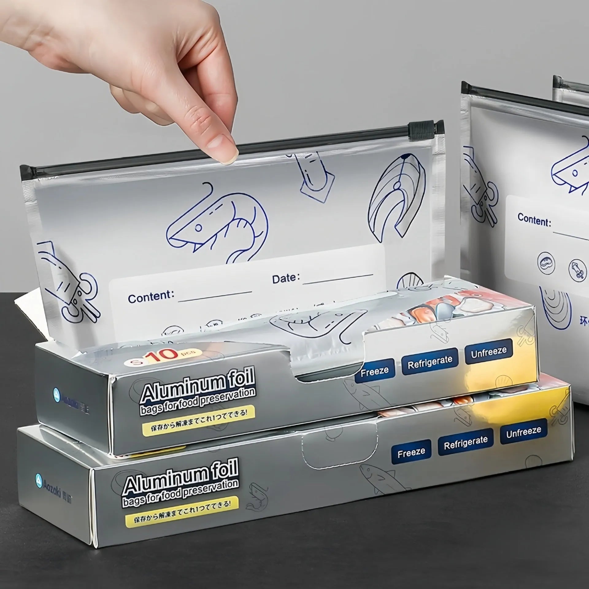 Aluminium foil fresh-keeping bags in large, medium, and small sizes for food storage.