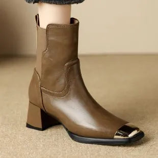 Brown cowhide leather Martin boots with a side zipper and low tube shaft.