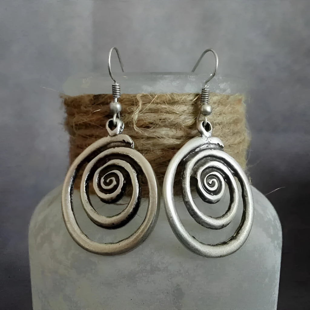 Geometric spiral earrings with distressed silver finish and retro design