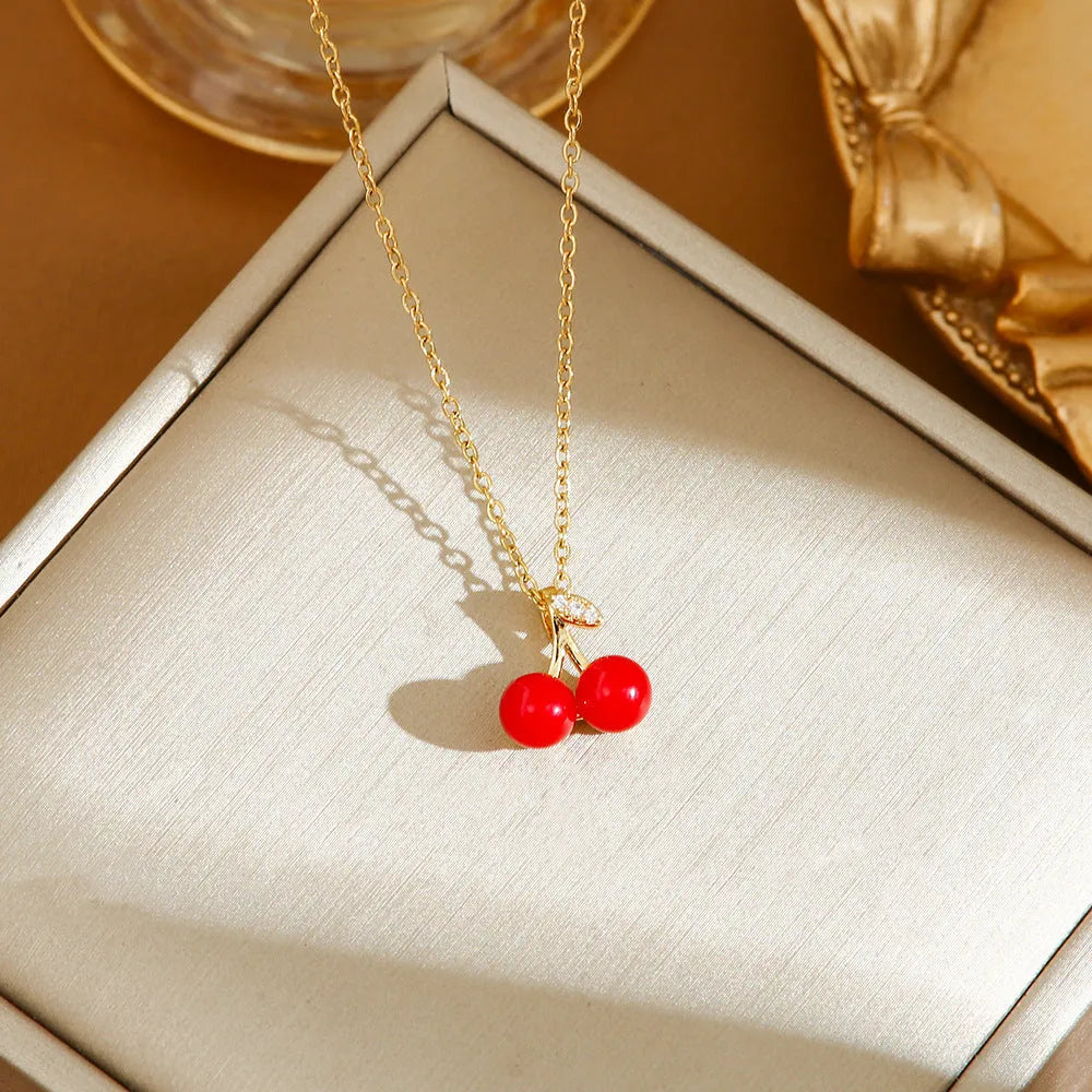 Women's titanium steel necklace with delicate strawberry, cherry and pepper charms on O-ring chain