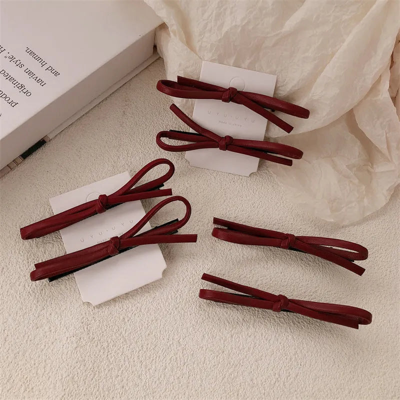 Wine red leather bow barrettes hair clips handcrafted construction
