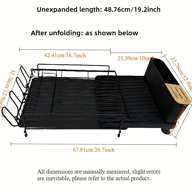 Retractable foldable kitchen dish drain rack for cutlery and cups on a countertop.