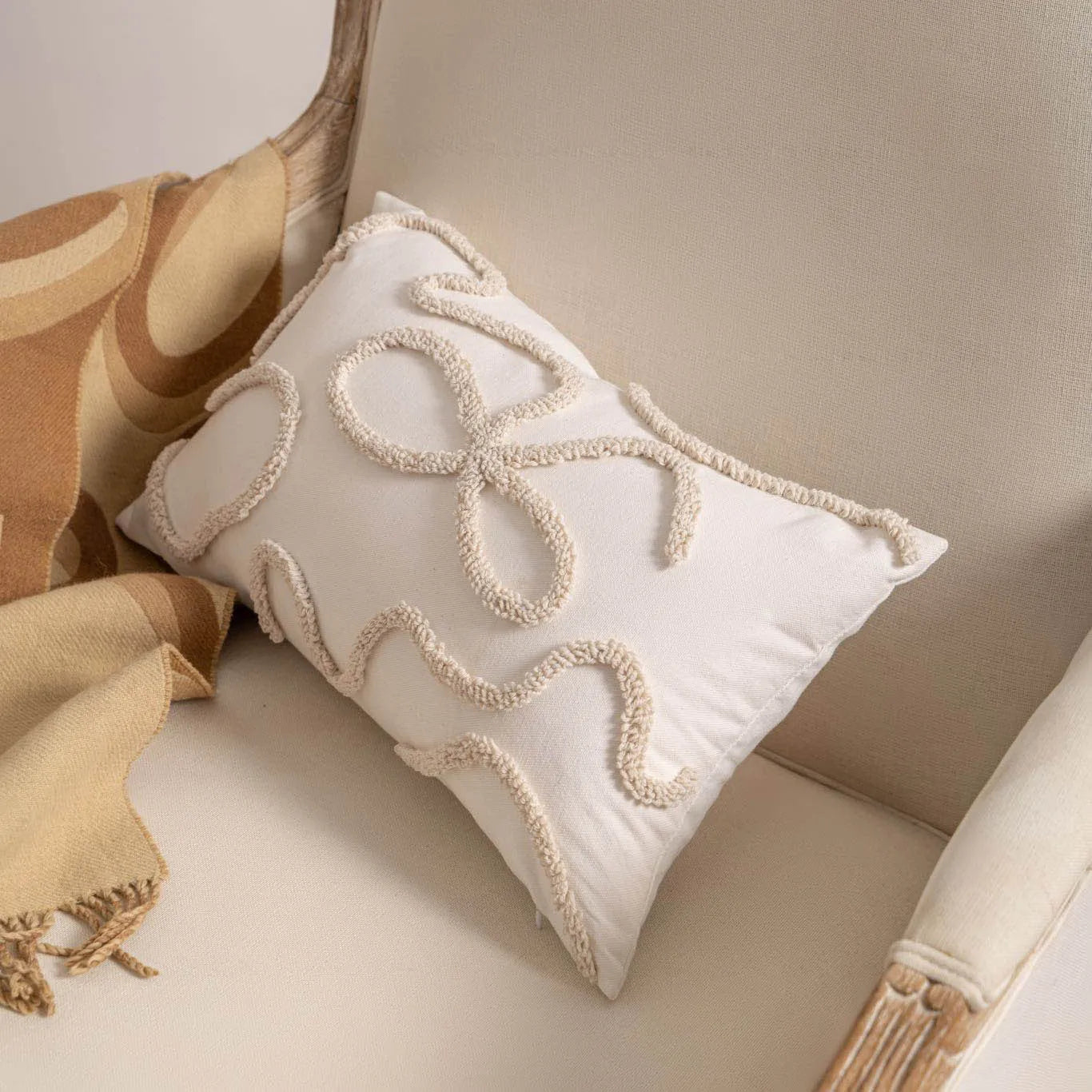 Knitted striped cushion cover with tassel decoration in a choice of six patterns.