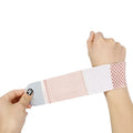 Athletic wristguard in pink black or gray showing high elastic breathable fabric for wrist support