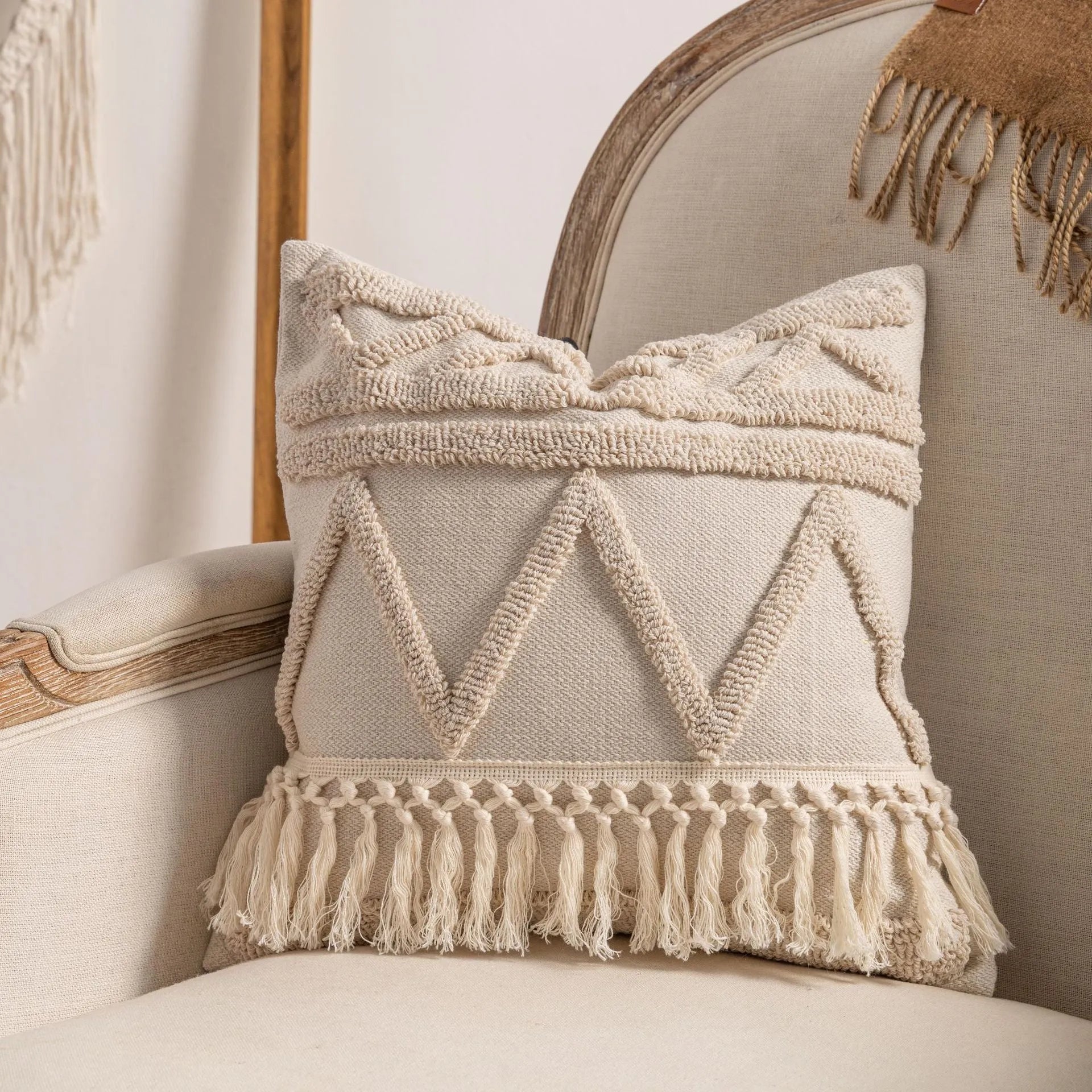 Knitted striped cushion cover with tassel decoration in a choice of six patterns.