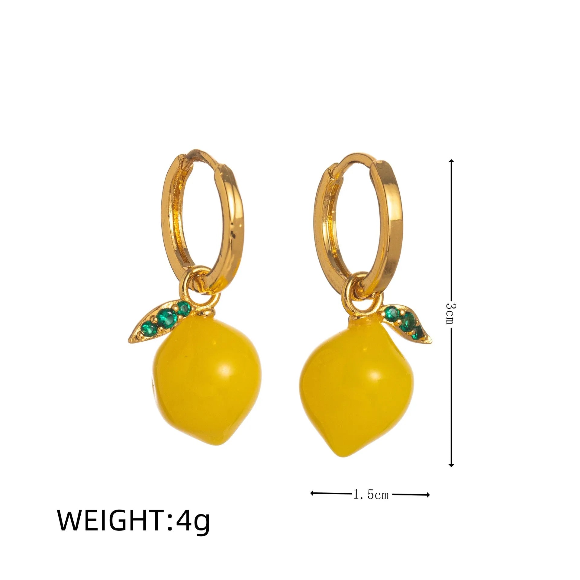 Gold plated copper earrings with colourful fruit and vegetable designs including carrot, lemon, and blueberry styles.