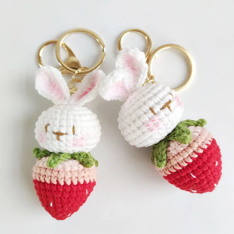 Hand-woven white rabbit strawberry pendant with keychain in cartoon style
