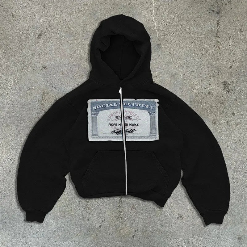 Man and woman modelling a loose fit black hoodie jacket with a white letters pattern and front zip pockets.