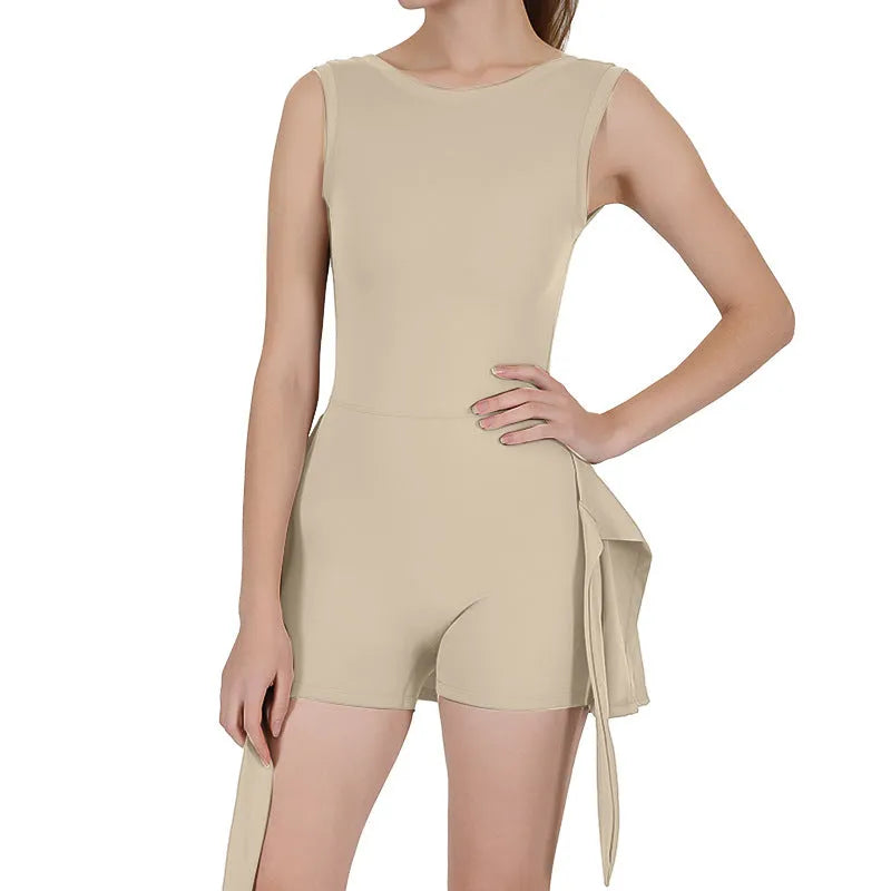 Women's solid colour tennis skirt with built-in safety shorts, shown in Barbie pink.