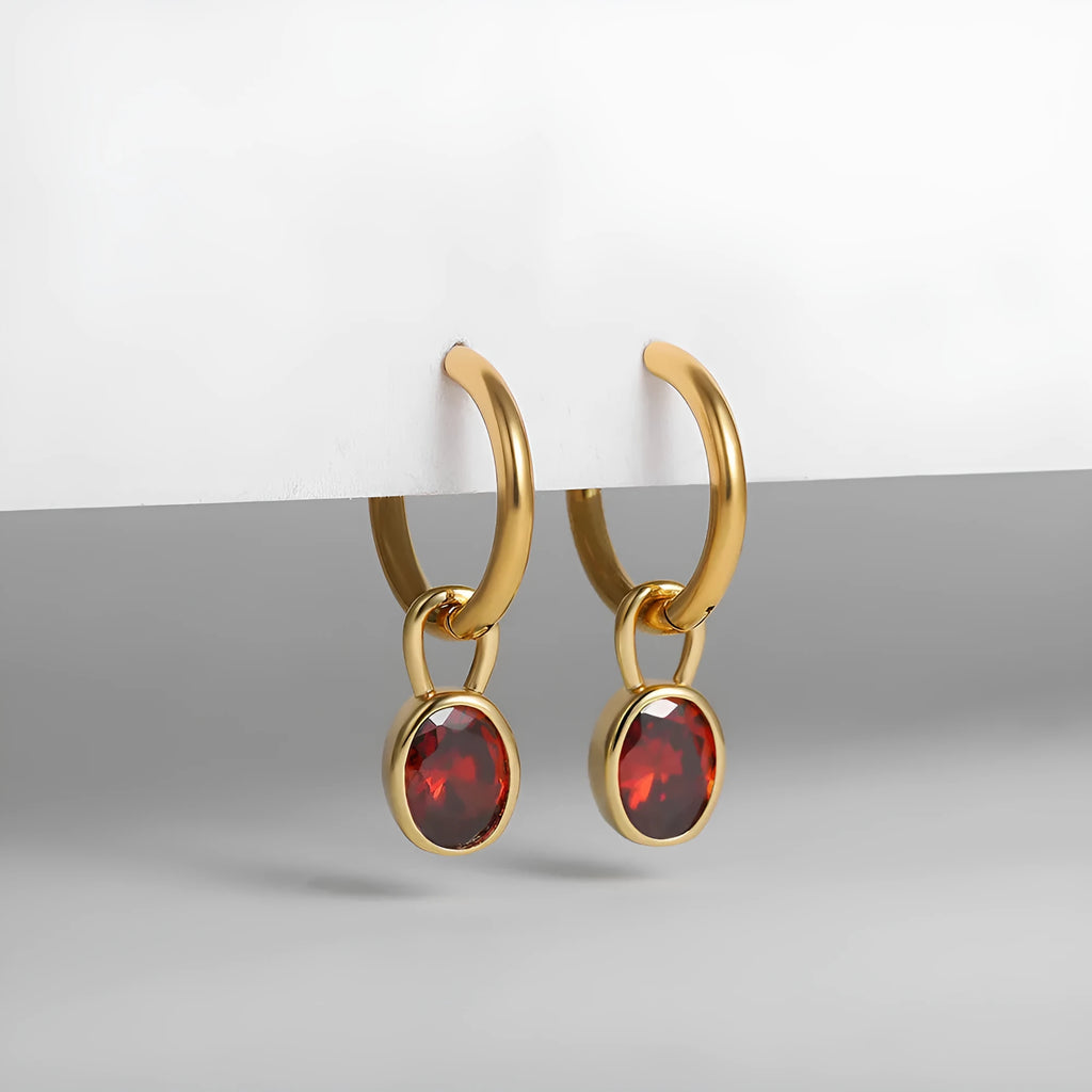 Women's oval zircon earrings in retro copper setting, showing colour options: white, emerald, green, black, red, blue.