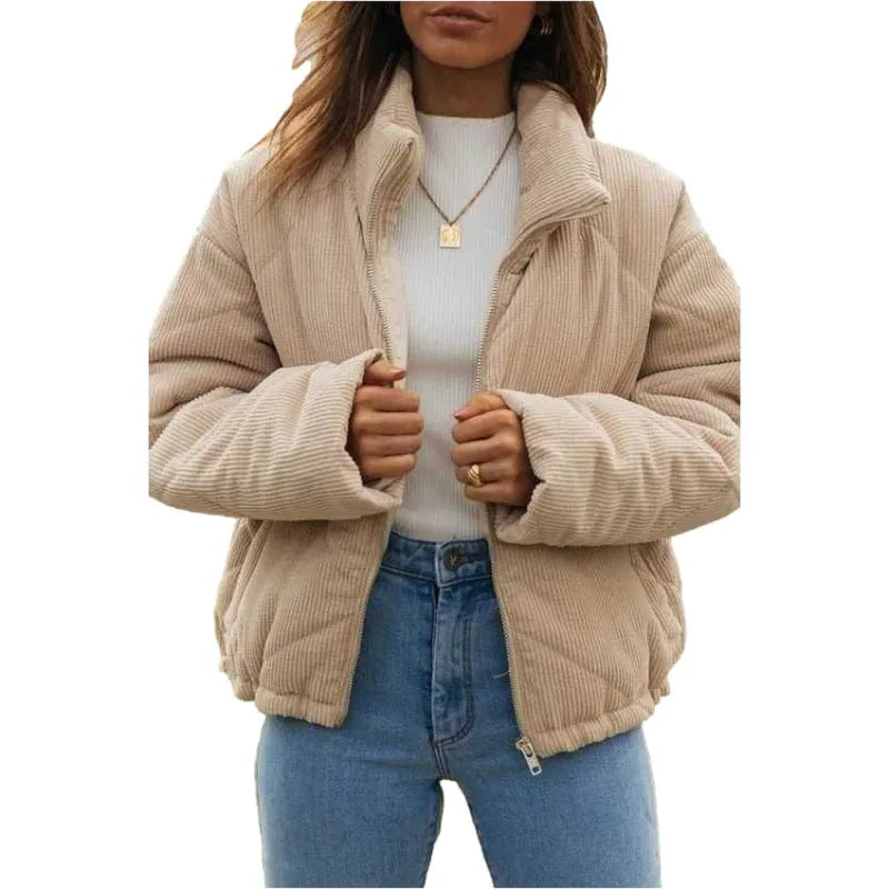 Apricot women's corduroy zip-up jacket with a stand collar, shown on a model.
