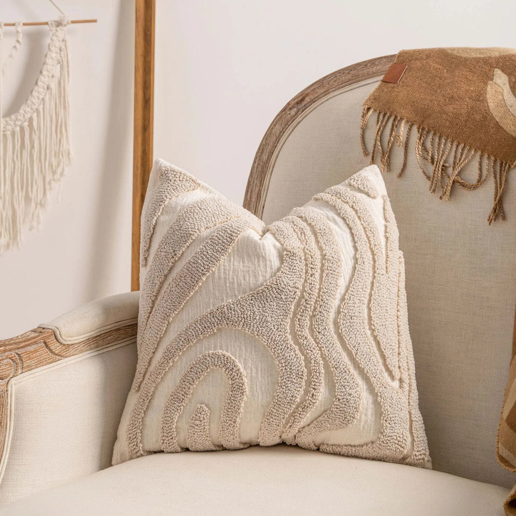 Knitted striped cushion cover with tassel decoration in a choice of six patterns.
