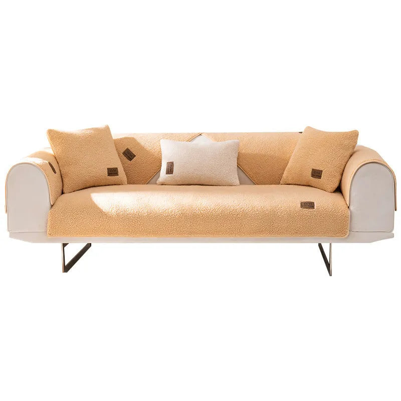 Lambswool sofa cover in solid blue colour on a three-seater sofa