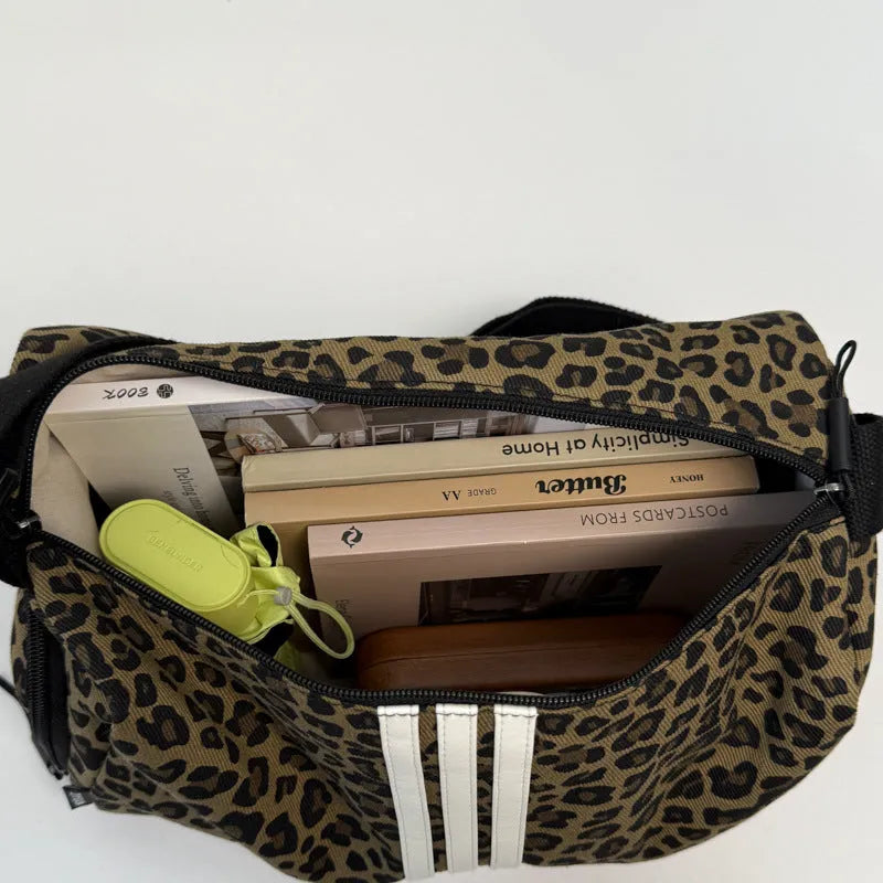Large capacity leopard print sports messenger bag with cross-body strap and stitching details