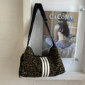 Large capacity leopard print sports messenger bag with cross-body strap and stitching details