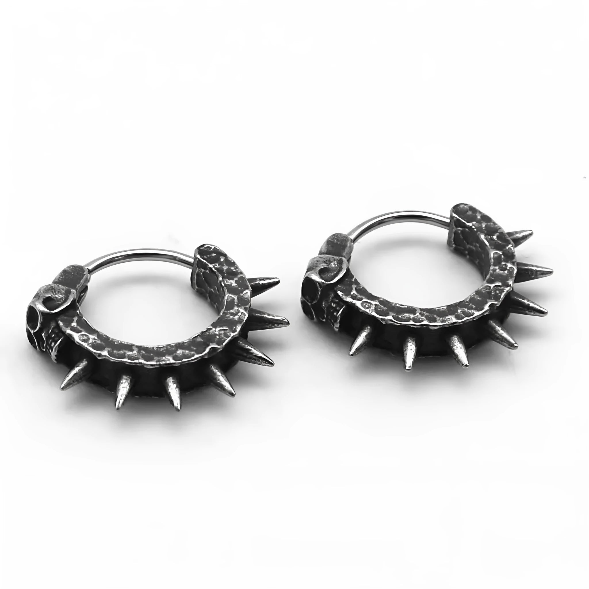 A pair of black alloy earrings with a geometric motorcycle punk design on a white background.