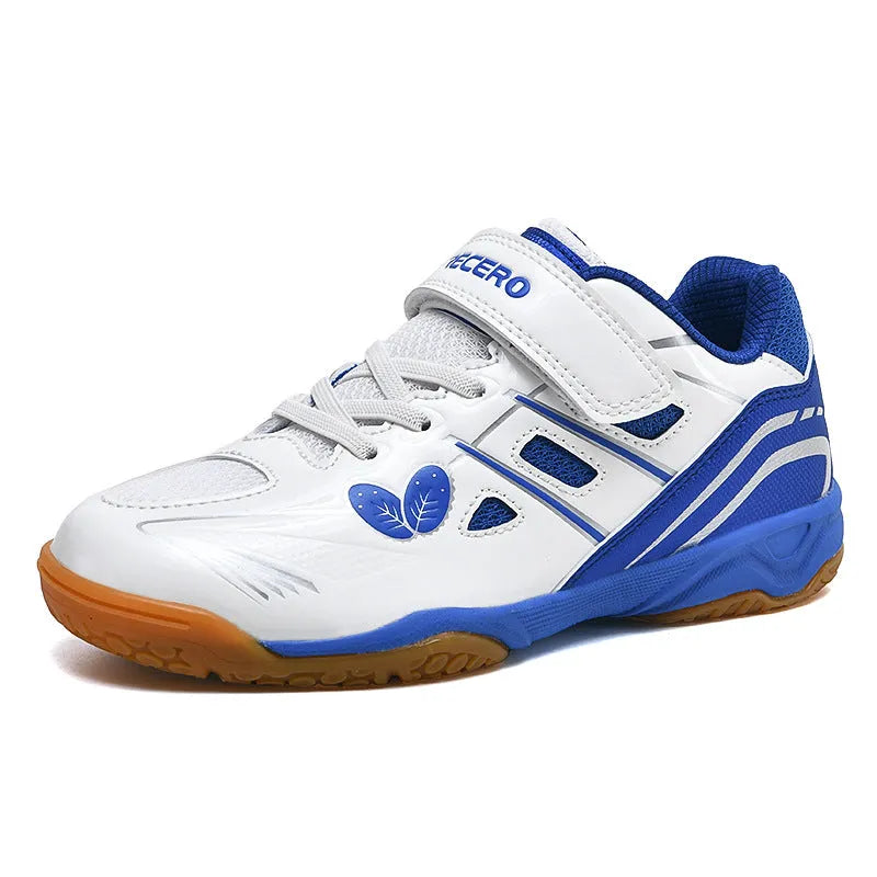 White and blue low top badminton shoes with a ribbed sole and breathable PVC upper.