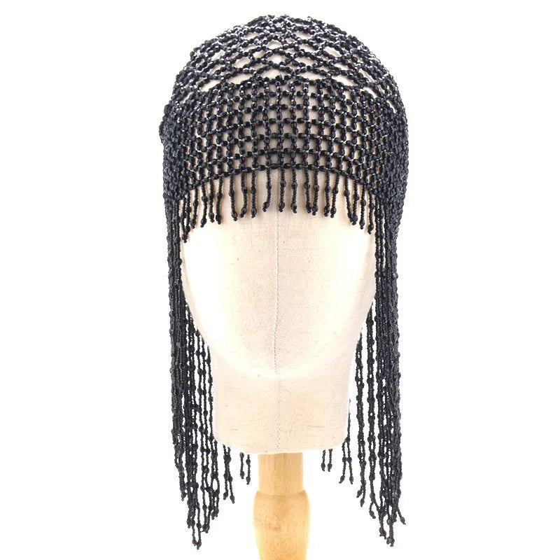 Belly dance headwear with alloy base, handmade beading, and 16.5cm tassels in silver or black mesh decoration