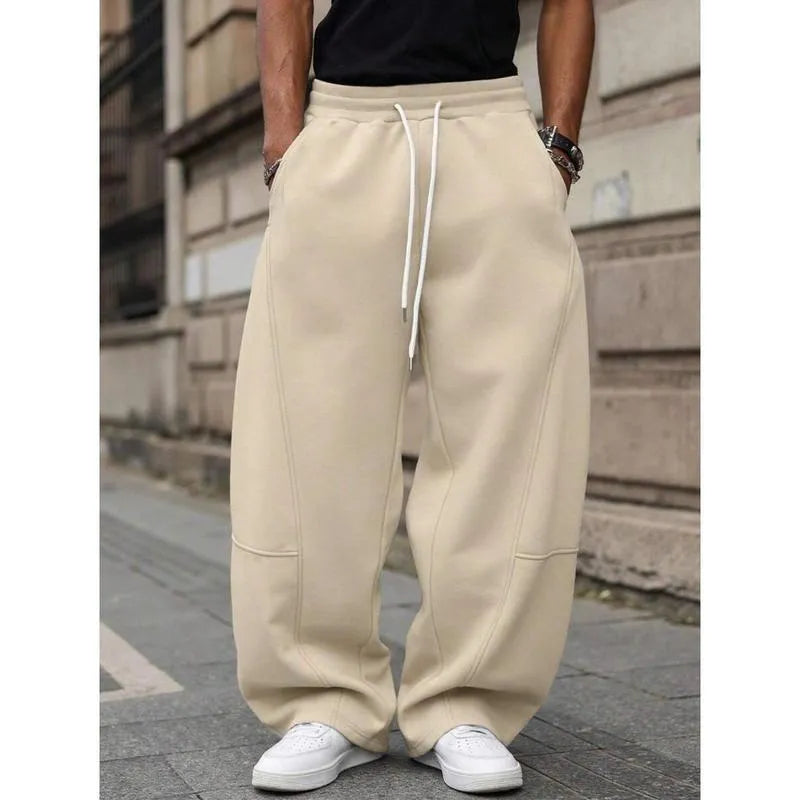 Men's straight leg high waist casual trousers in a grey colour with a cropped length and elasticated waistband.