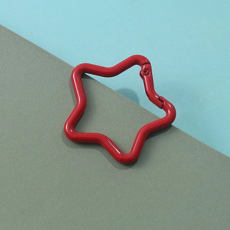 Zinc alloy five-pointed star keychain in multiple colour options for backpack decoration