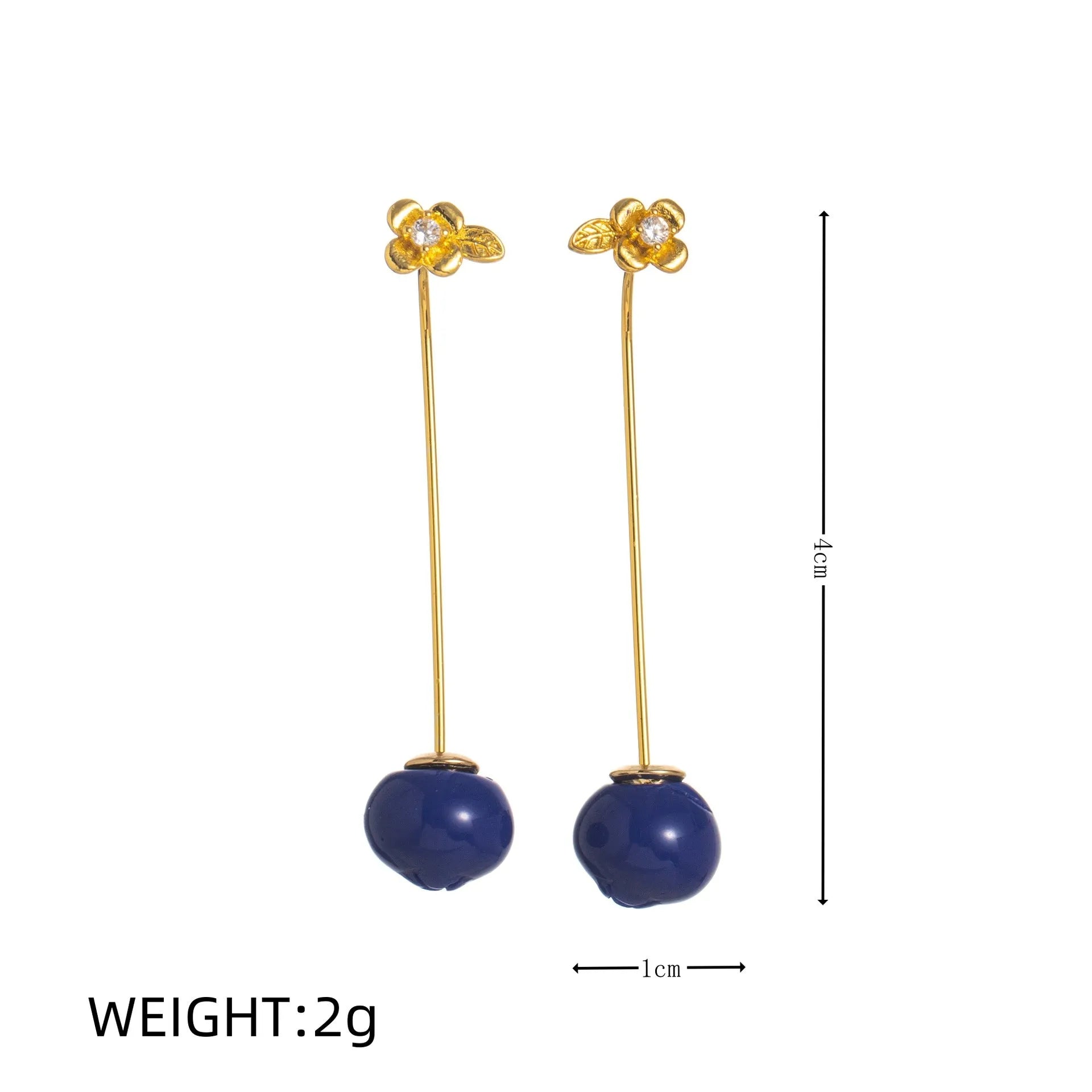 Gold plated copper earrings with colourful fruit and vegetable designs including carrot, lemon, and blueberry styles.