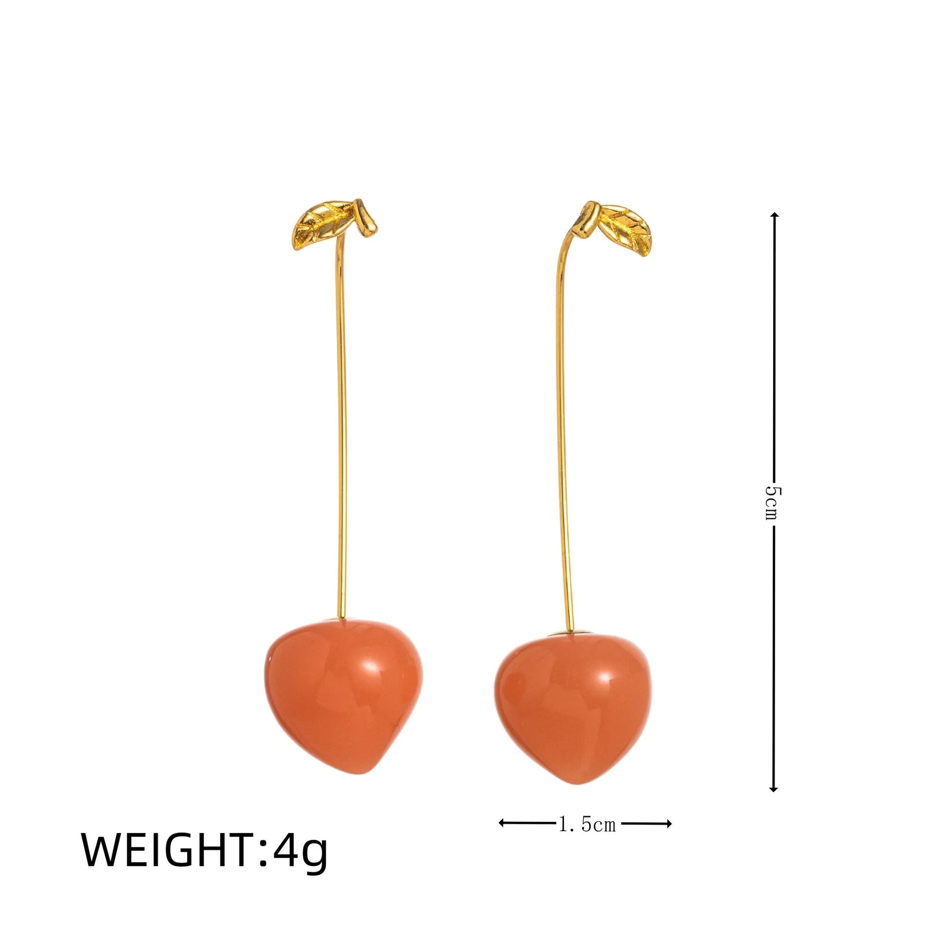 Gold plated copper earrings with colourful fruit and vegetable designs including carrot, lemon, and blueberry styles.