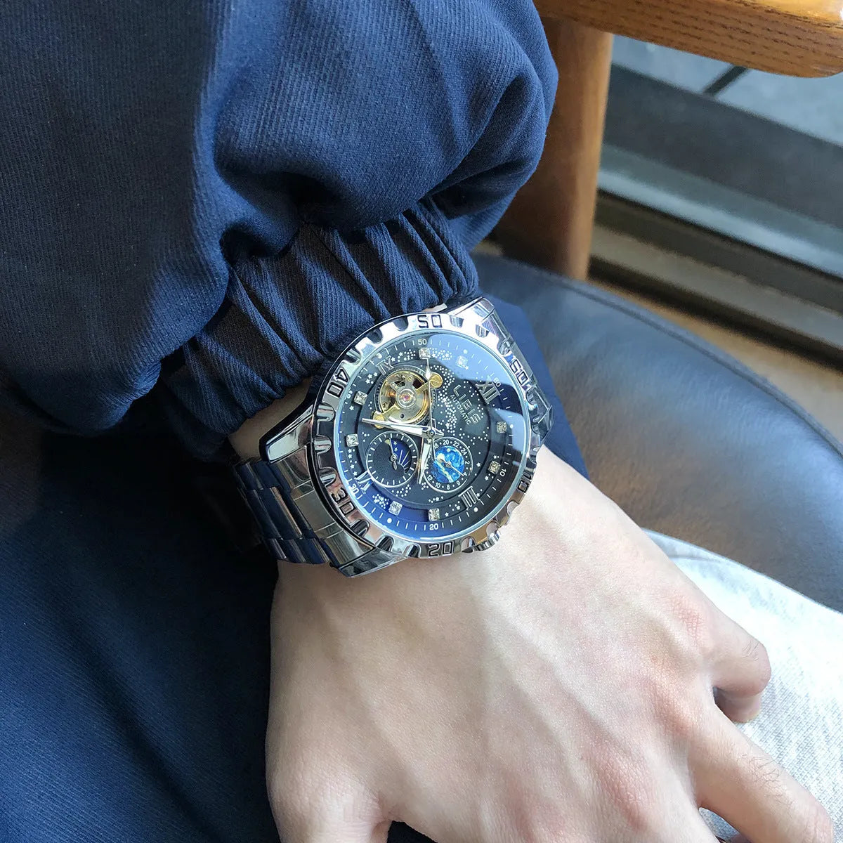 Men's silver automatic mechanical watch with black starry dial and leather strap