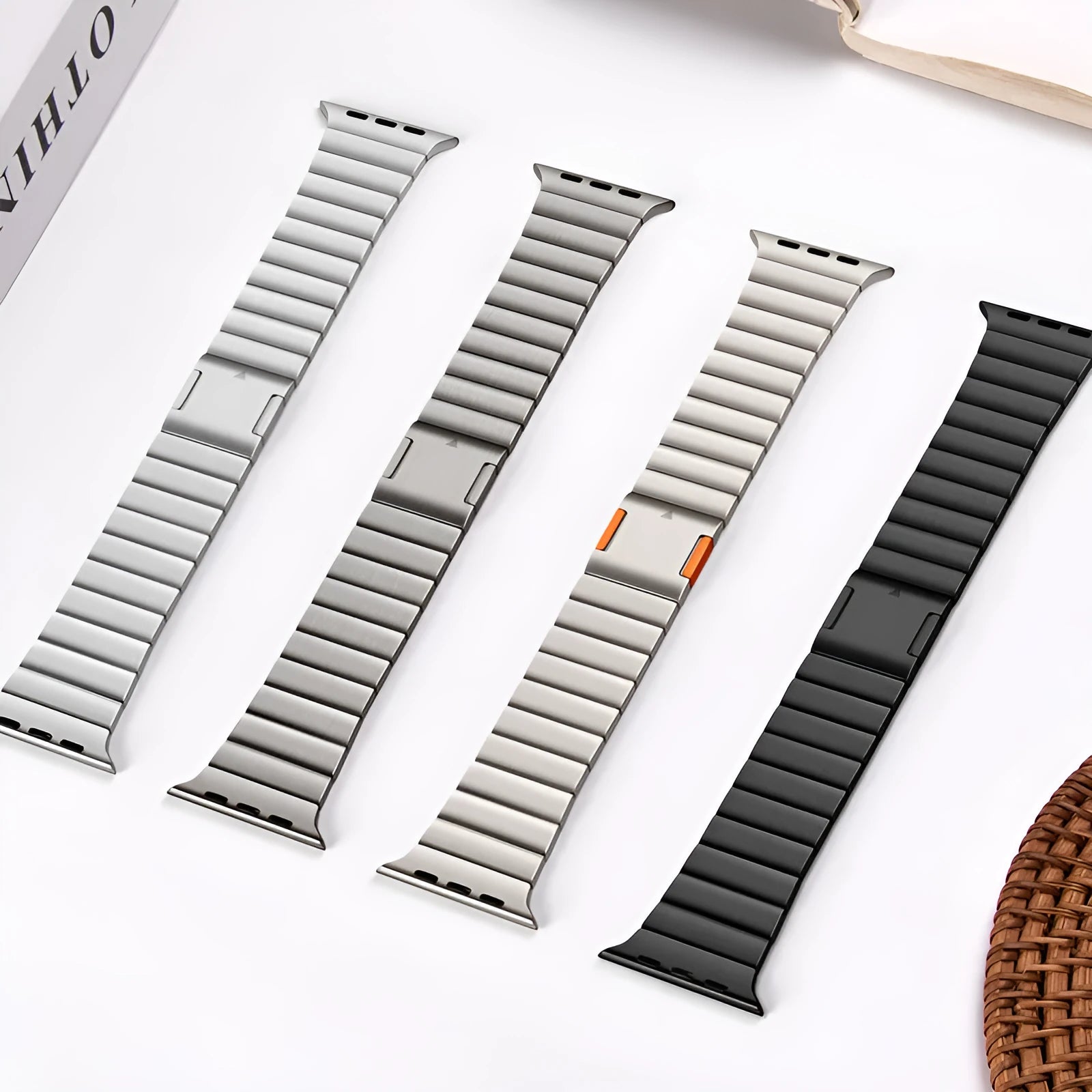Silver stainless steel magnetic buckle strap for an Apple Watch on a wrist