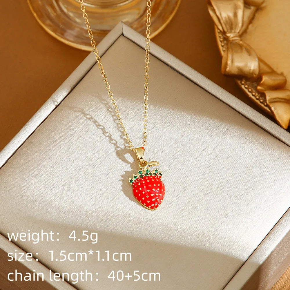 Women's titanium steel necklace with delicate strawberry, cherry and pepper charms on O-ring chain