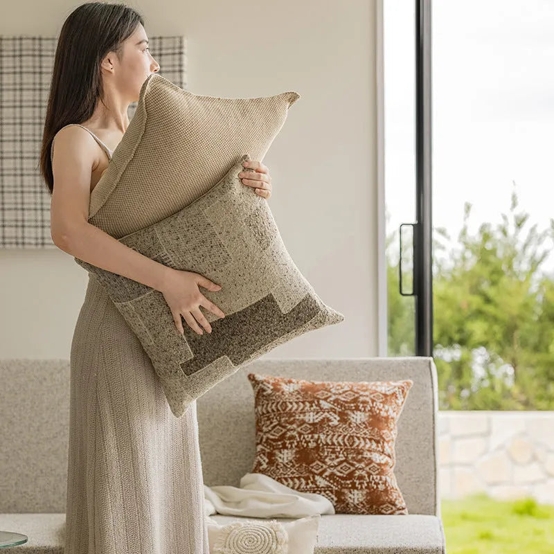 Solid colour square cushion cover with edge pressing detail, shown in Red Brown.