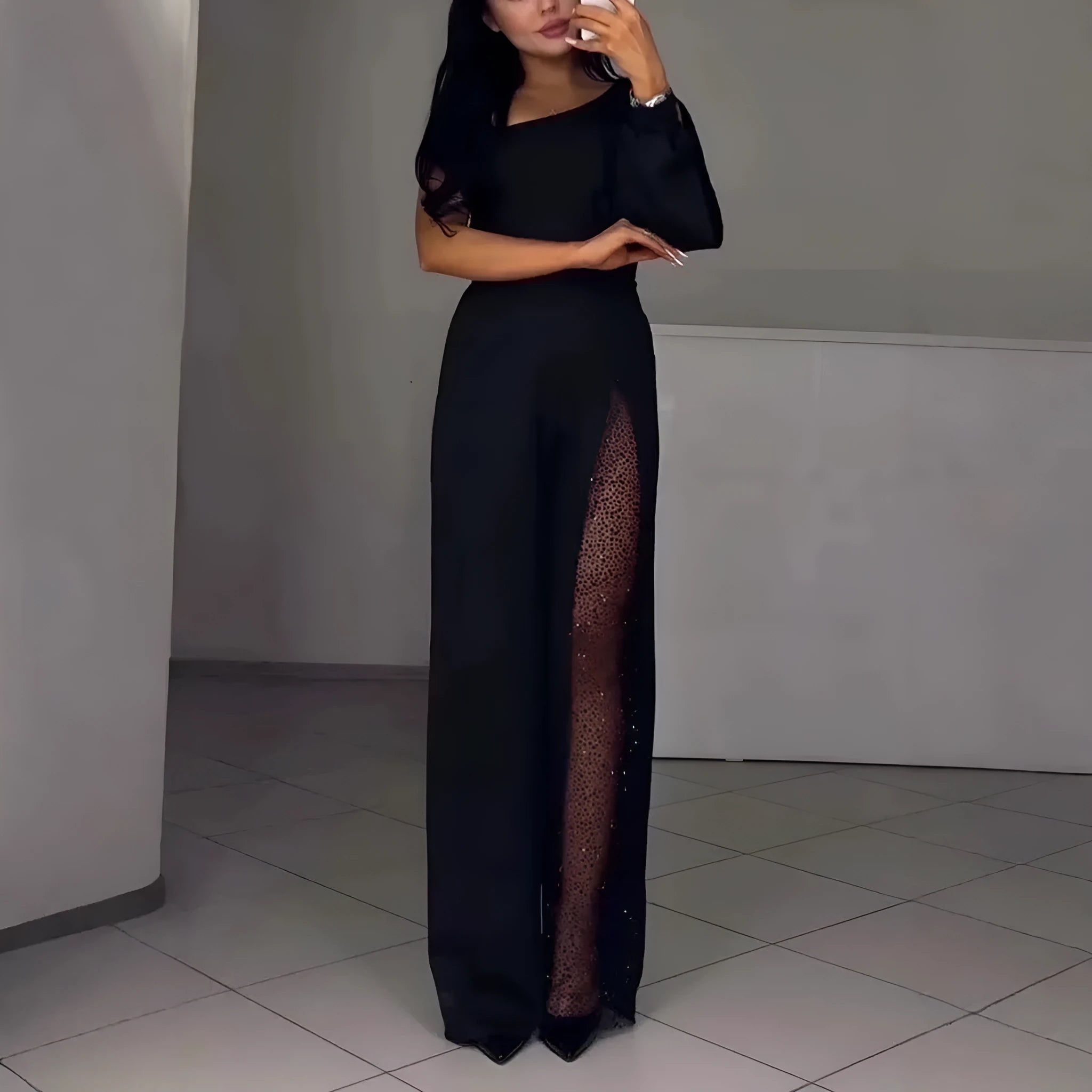Women's black oblique shoulder jumpsuit with high slit design and long sleeves
