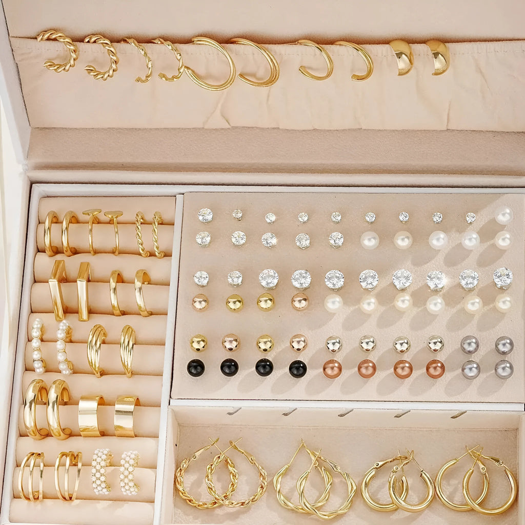 108 geometric pearl earrings with gold electroplated alloy construction and round elements