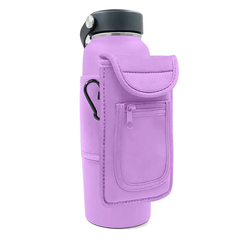 Fitness magnetic cup sleeve in grey with carabiner buckle, holding a large black sports water bottle.
