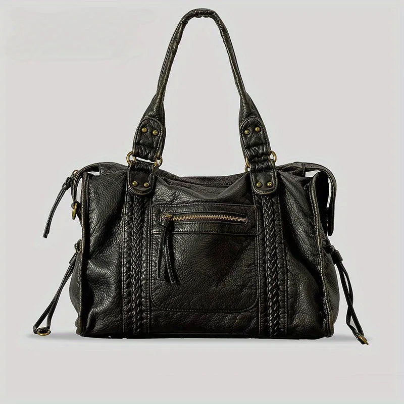 Women's retro motorcycle messenger shoulder bag with woven detail showing organised interior compartments