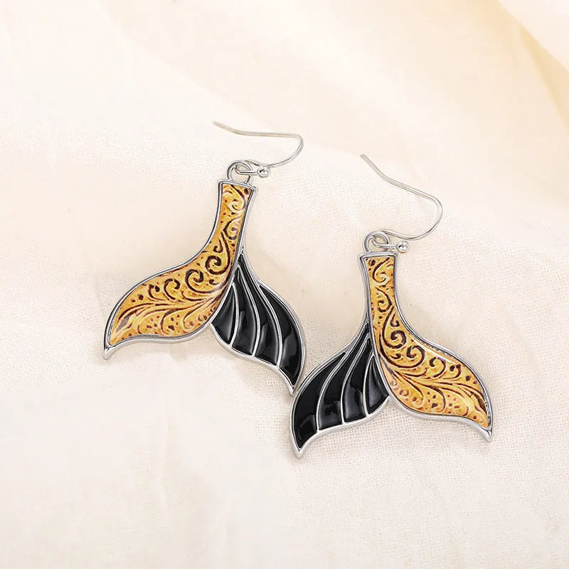 Women's retro fishtail earrings with whale details in white gold colour alloy