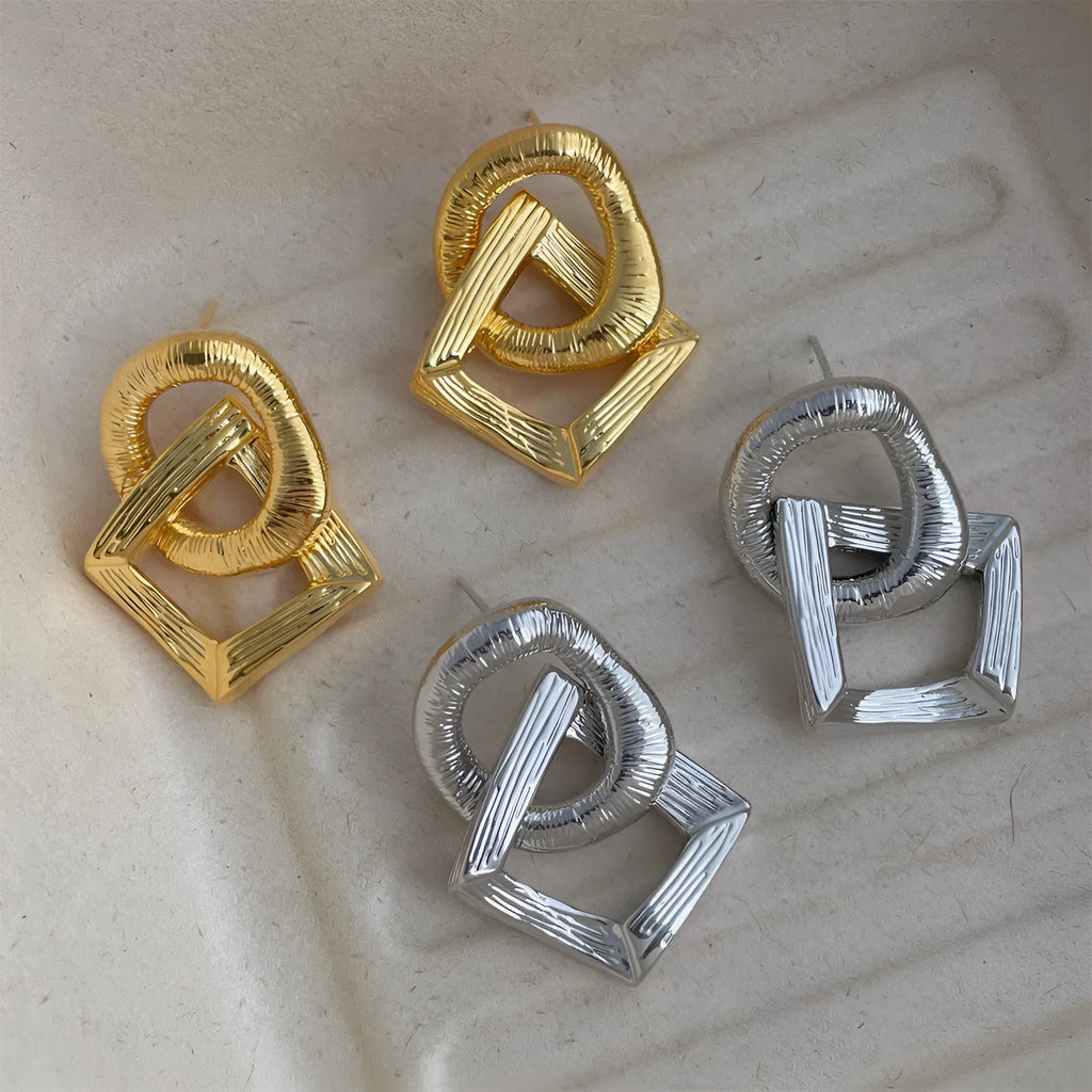 Geometric circle pendant earrings with 3.4cm drop in gold or silver tone electroplated copper