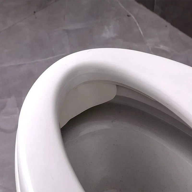 White plastic toilet urine blocking board for children's training and splash prevention