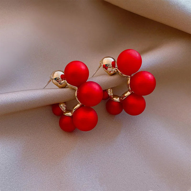 Red bell-shaped drop earrings for women made from alloy.