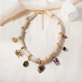 Electroplated heart-shaped resin necklace with bamboo design elements