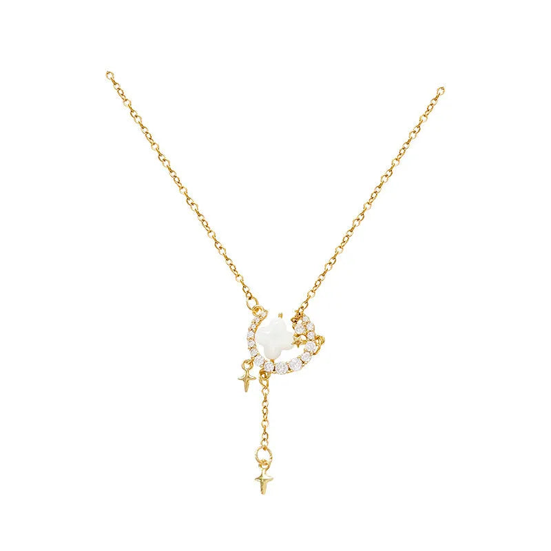 Women's star moon necklace with zirconium accents on adjustable chain in gold or silver finish
