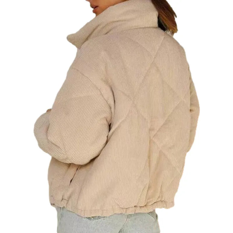 Apricot women's corduroy zip-up jacket with a stand collar, shown on a model.