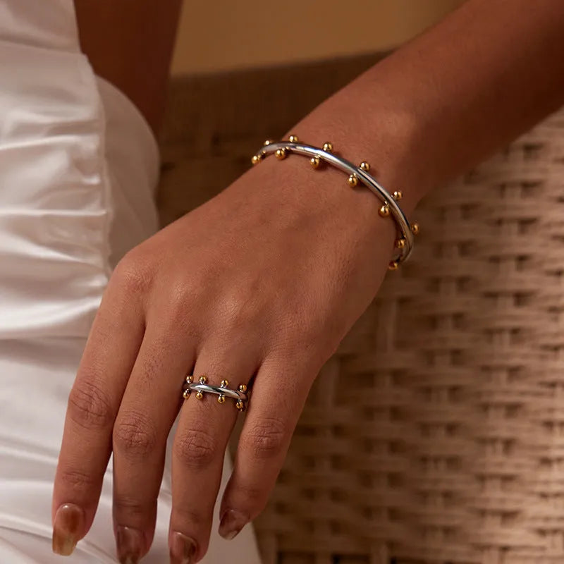 Stainless steel rivet texture C-shaped bean beads personality bracelet with alloy bracelet in gold, steel or steel gold finishes