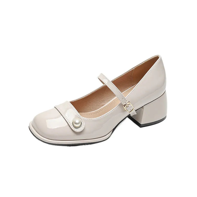 Plus size women's patent leather chunky heel pumps with square toe and buckle fastening in apricot colour.