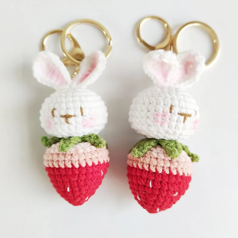 Hand-woven white rabbit strawberry pendant with keychain in cartoon style