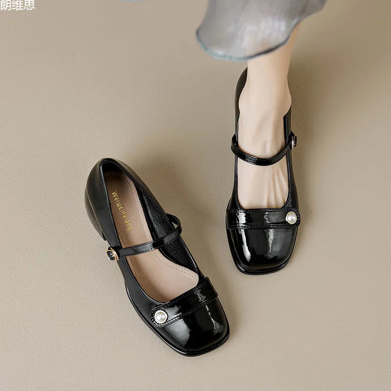 Plus size women's patent leather chunky heel pumps with square toe and buckle fastening in apricot colour.