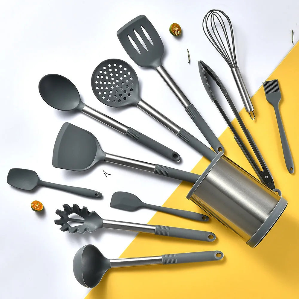 Silicone kitchen utensil set with 12 pieces including spatula, turner, ladel, and food clip in rotating storage bucket
