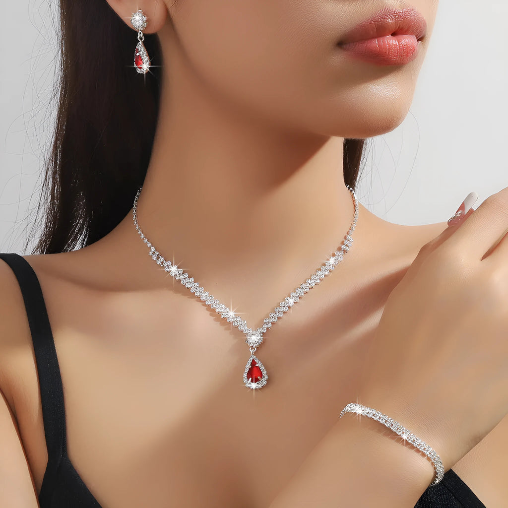 Claw chain rhinestone jewellery set with drop-shaped stones in multiple colour options